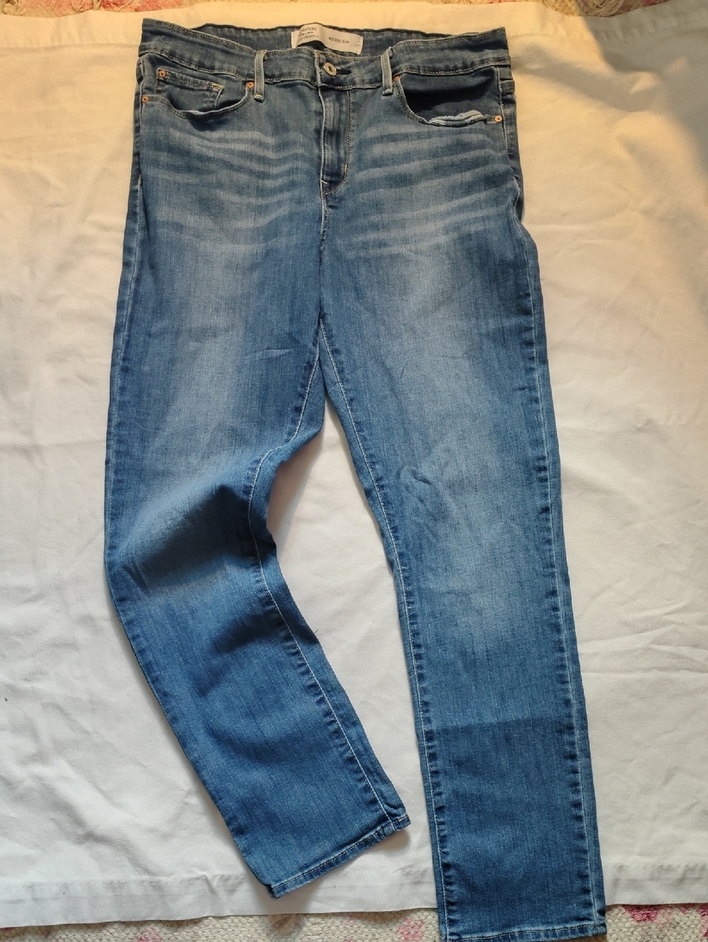 Signature by Levi Strauss Faded Light Blue Women's Mid Rise Slim Jeans